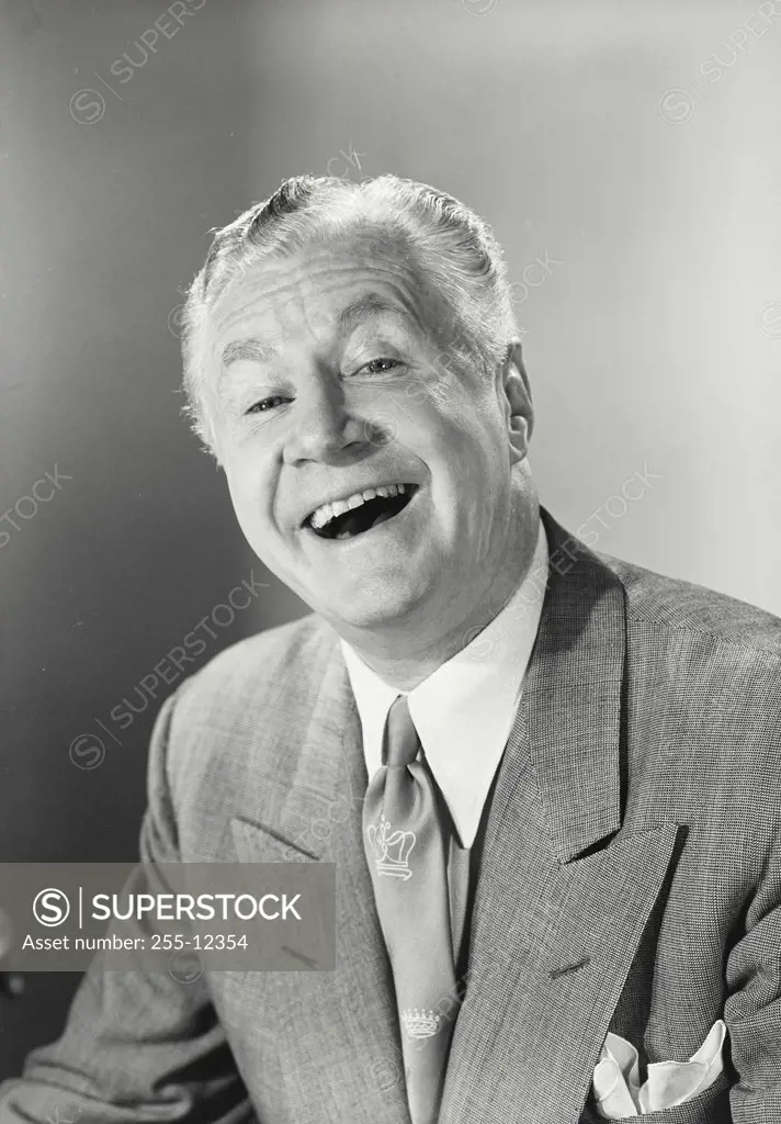 Vintage photograph. Portrait of older businessman smiling
