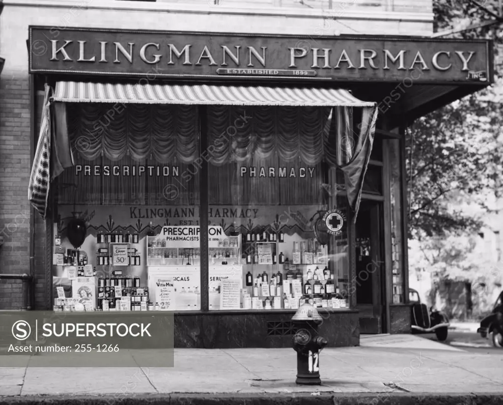 Vintage Photograph. Exterior of Klingmann Pharmacy storefront display