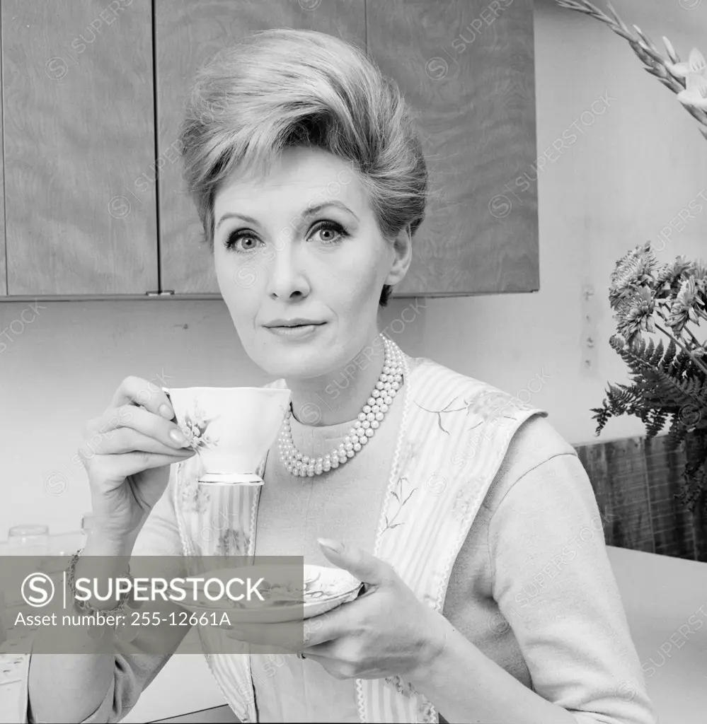 Portrait of a mature woman holding a tea cup