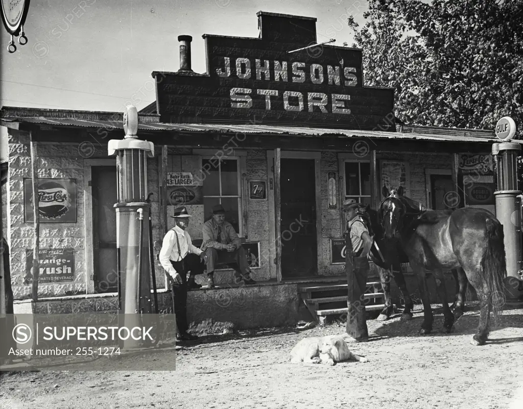 Vintage Photograph. Three men with dog and horses outside Johnson's Store, a country crossroads store near Owingsville, Kentucky