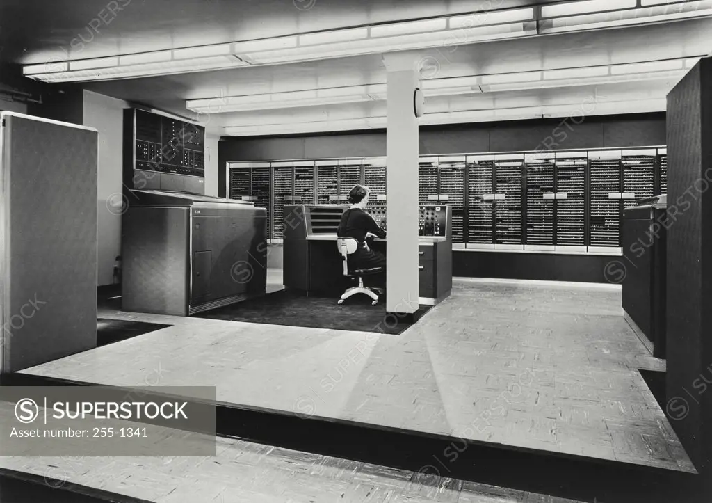 Vintage photograph. Faith Lillibridge working on the NORC (Naval Ordnance Research Calculator) built by IBM, most powerful large scale electronic computer produced at the time. Built by Watson Scientific Computing Laboratory, operated by IBM at Columbia University