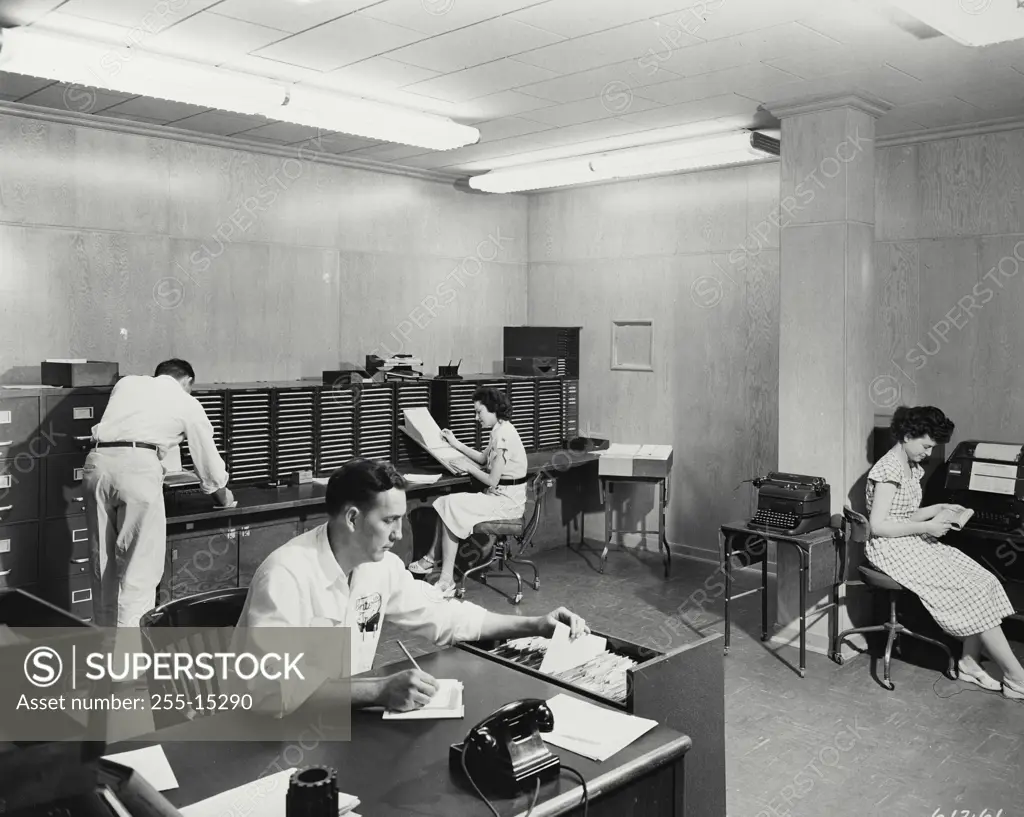 Vintage Photograph. Caterpillar dealers stock records and order department.