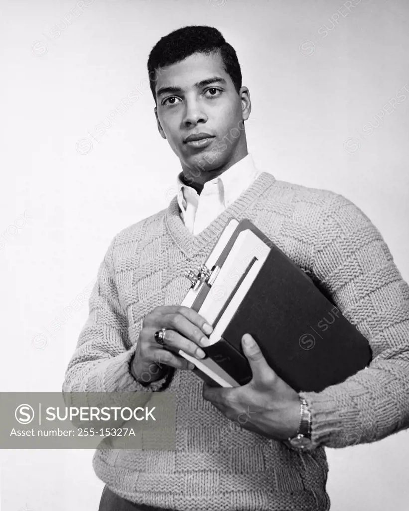 College student holding books