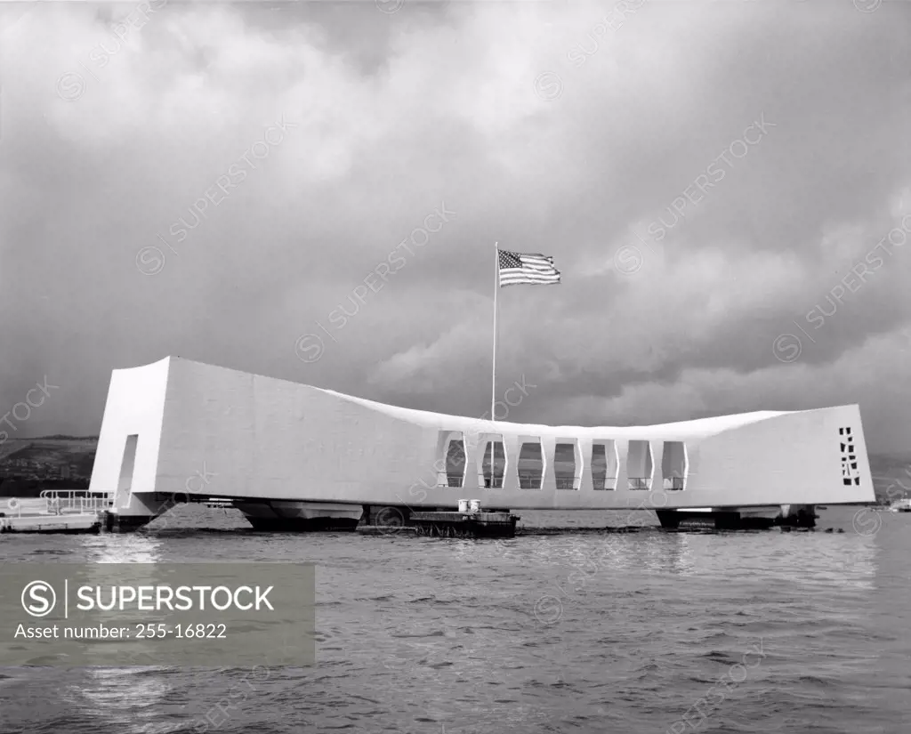 American flag fluttering over a memorial, USS Arizona Memorial, Pearl Harbor, Oahu, Hawaii, USA