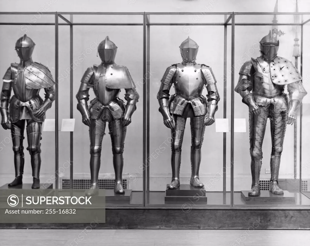 Suits of armor in a display cabinet
