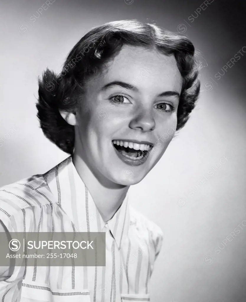 Portrait of a teenage girl laughing