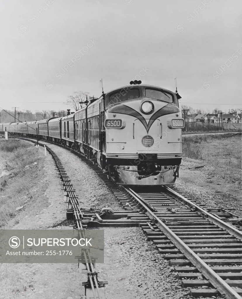 Passenger train on railroad tracks, Super Continental, Canadian National Railway