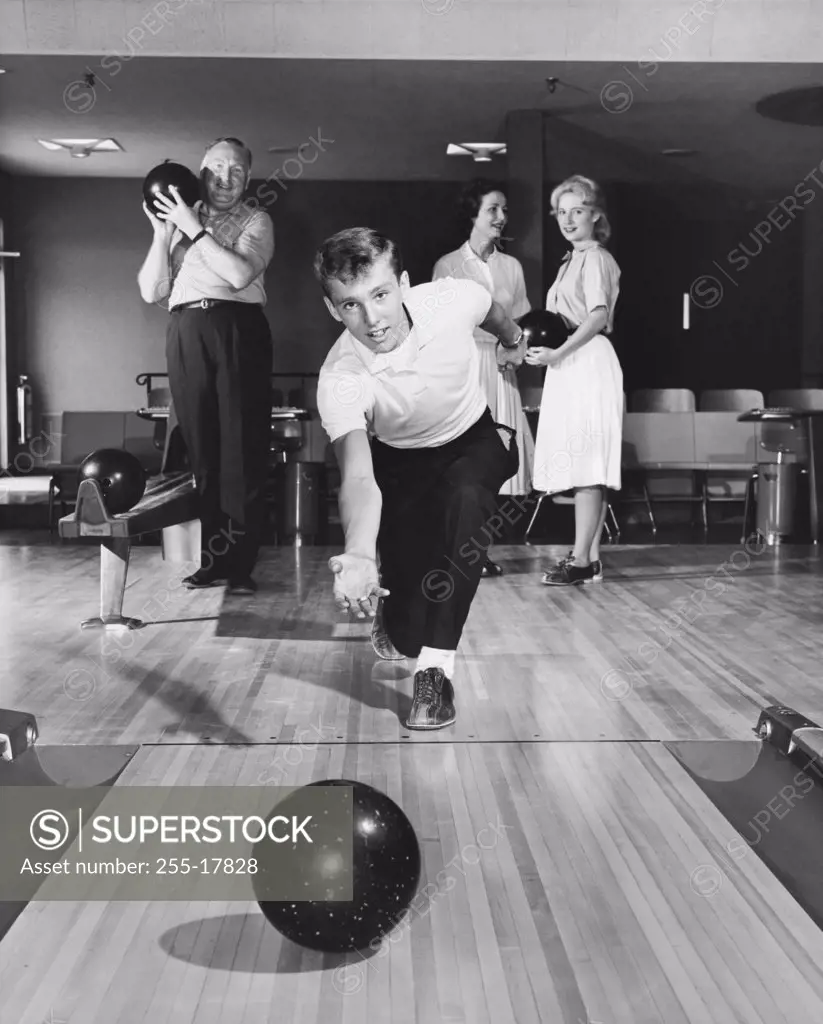 Front view of a family bowling