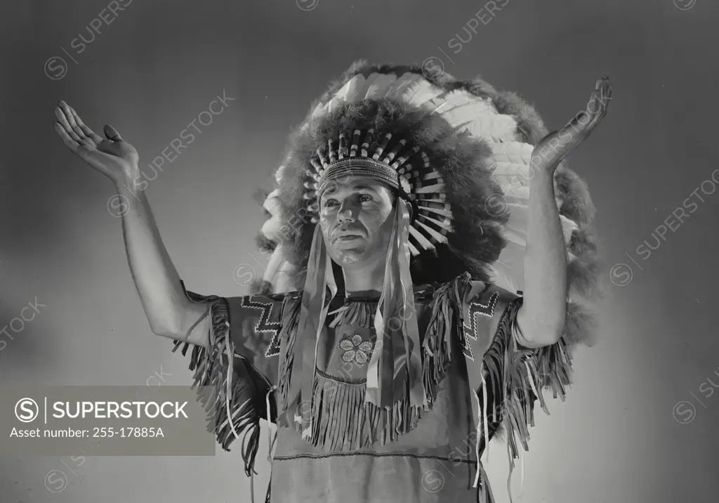Vintage Photograph. Caucasian man in Native American head dress. Frame 4
