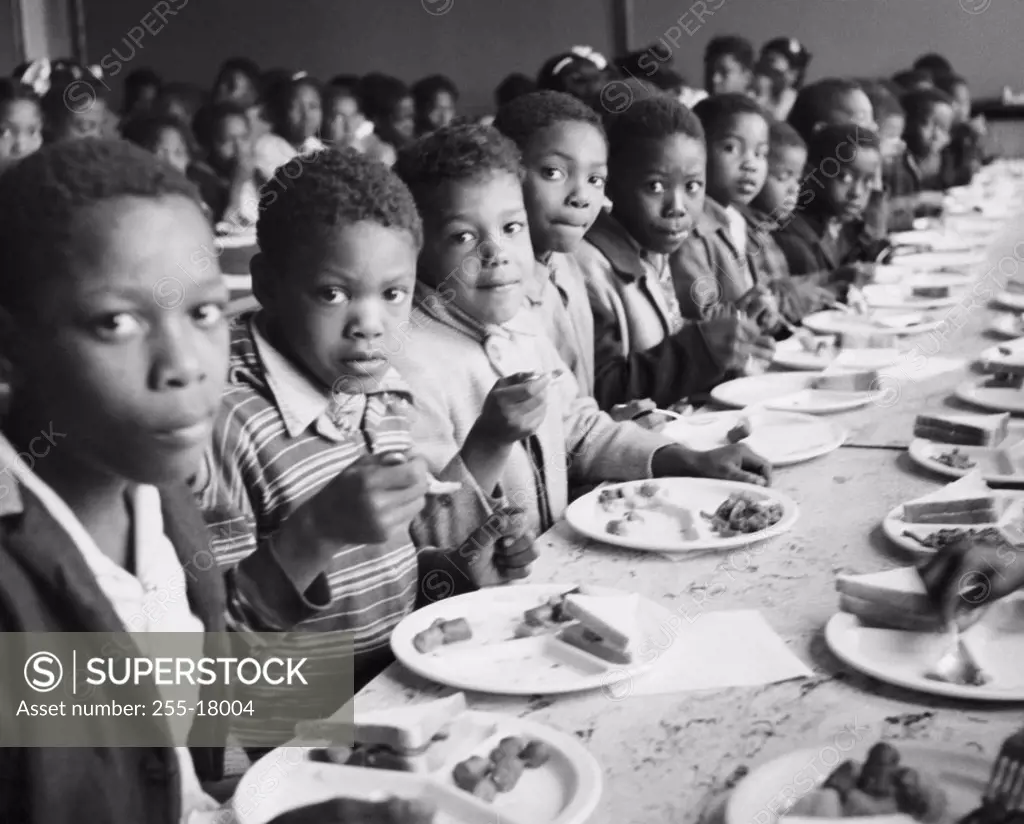 Large group of children having lunch