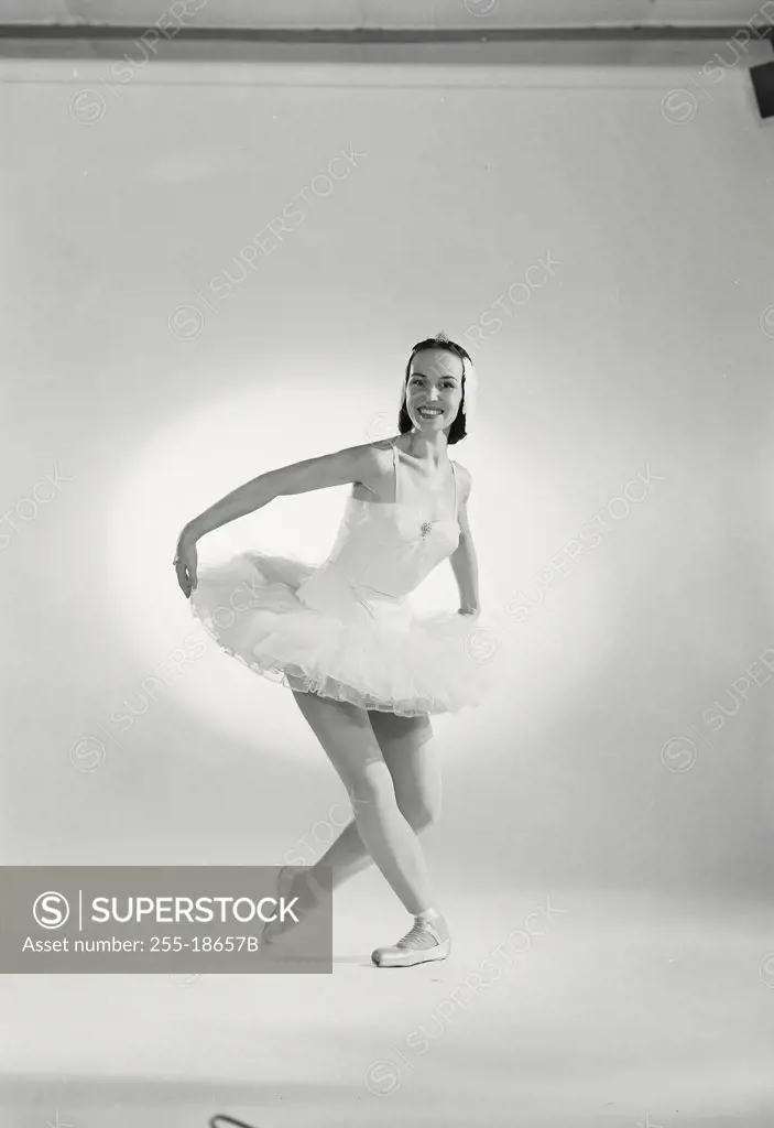 Ballet dancer on white backround.