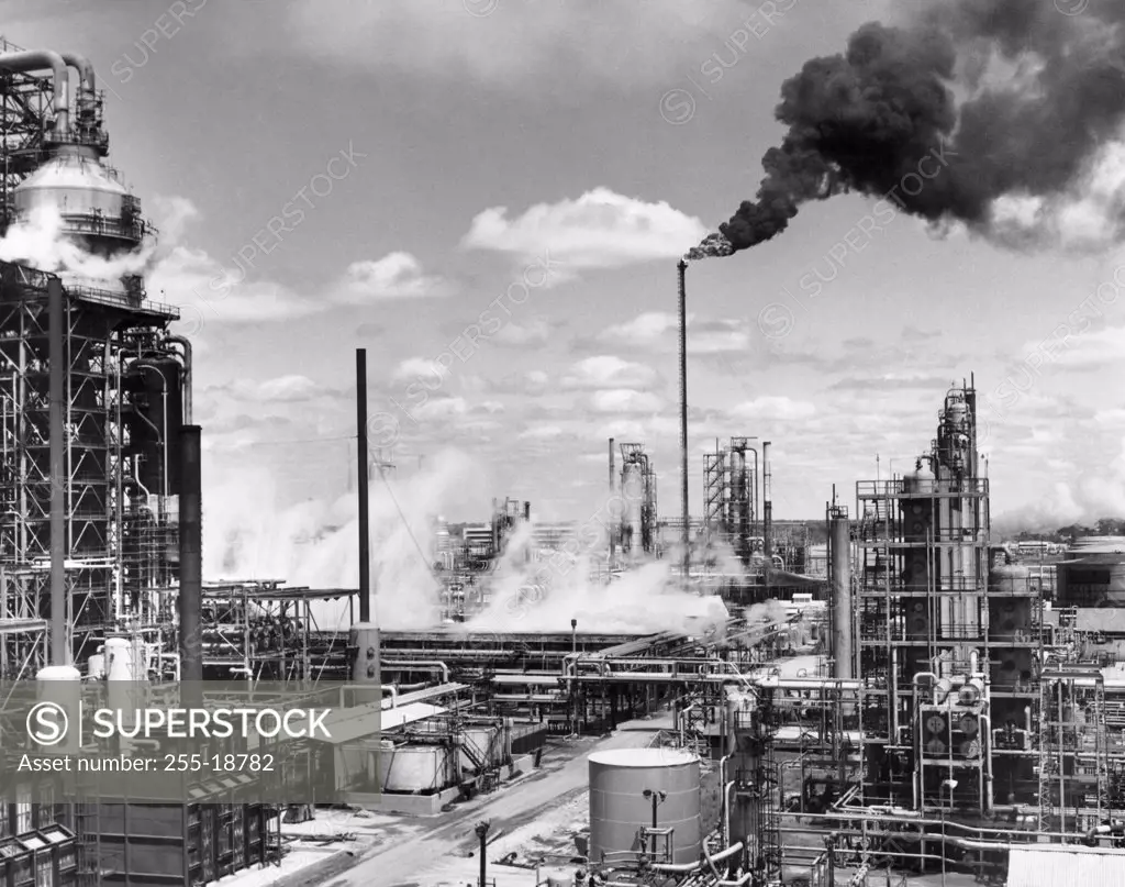 Smoke emitting from smoke stacks of an oil refinery, Standard Oil Company, Baton Rouge, Louisiana, USA