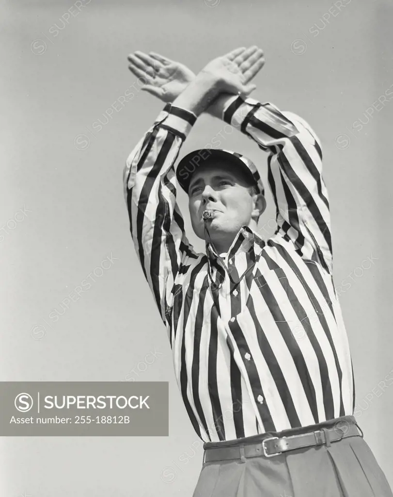 Vintage photograph. Football referee calling time out