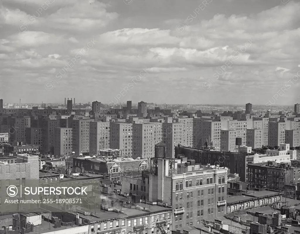 Vintage photograph. View looking at apartment buildings in New York from a rooftop