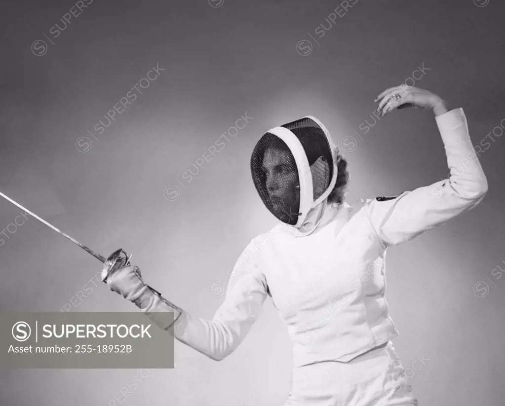 Young woman fencing
