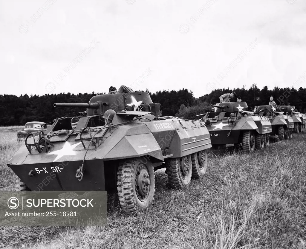 Military tanks in a field, M8 Greyhound, US Military, 1943
