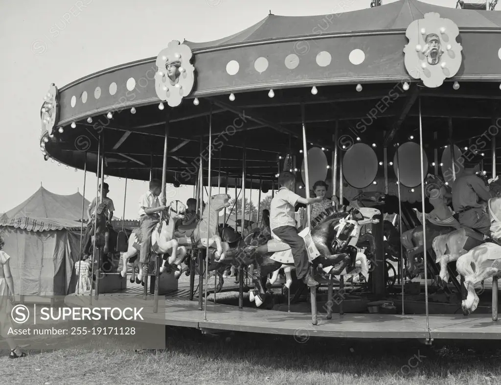 Vintage photograph. children on carousel