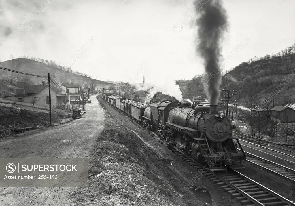 Vintage photograph. Coal train moving on railroad track, Baltimore And Ohio Railroad, Grafton, West Virginia, USA