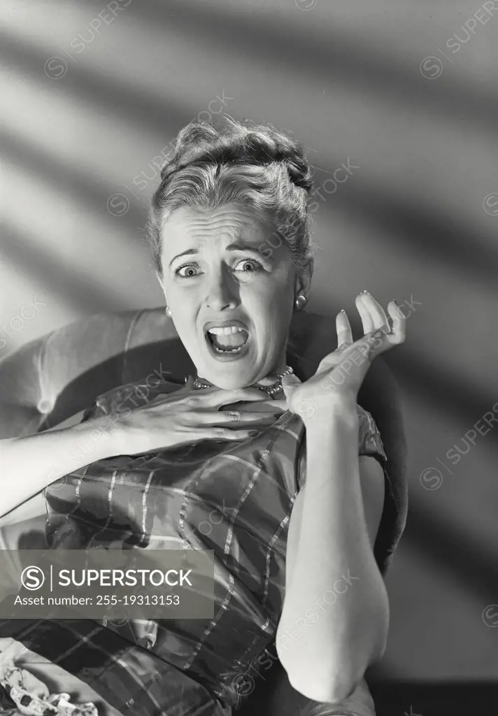 Woman with shocked and scared expression