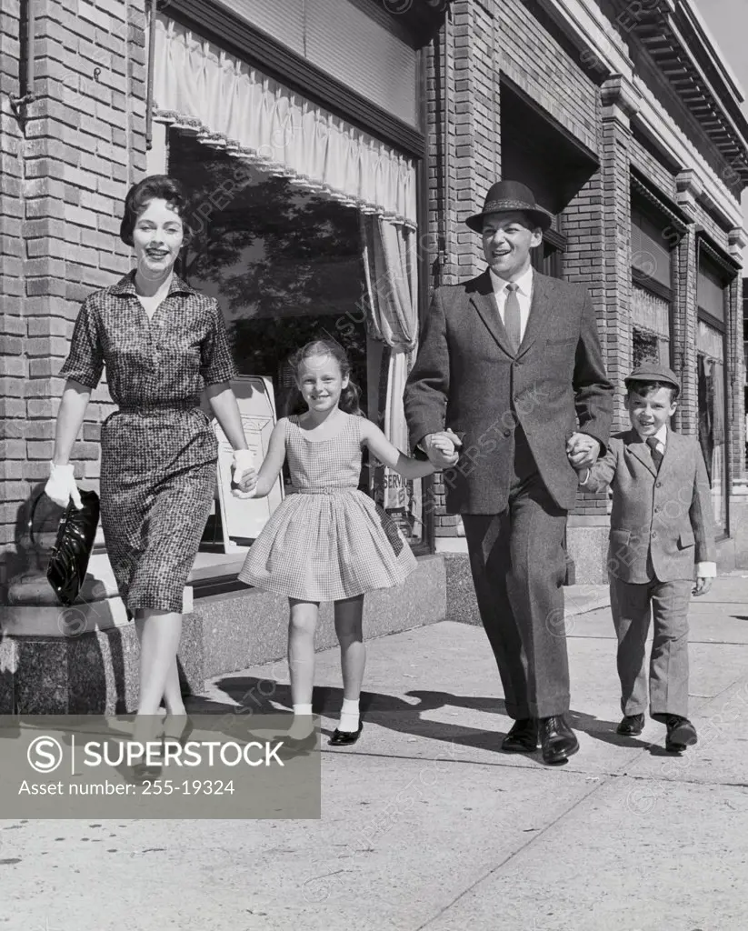 Family walking on the sidewalk