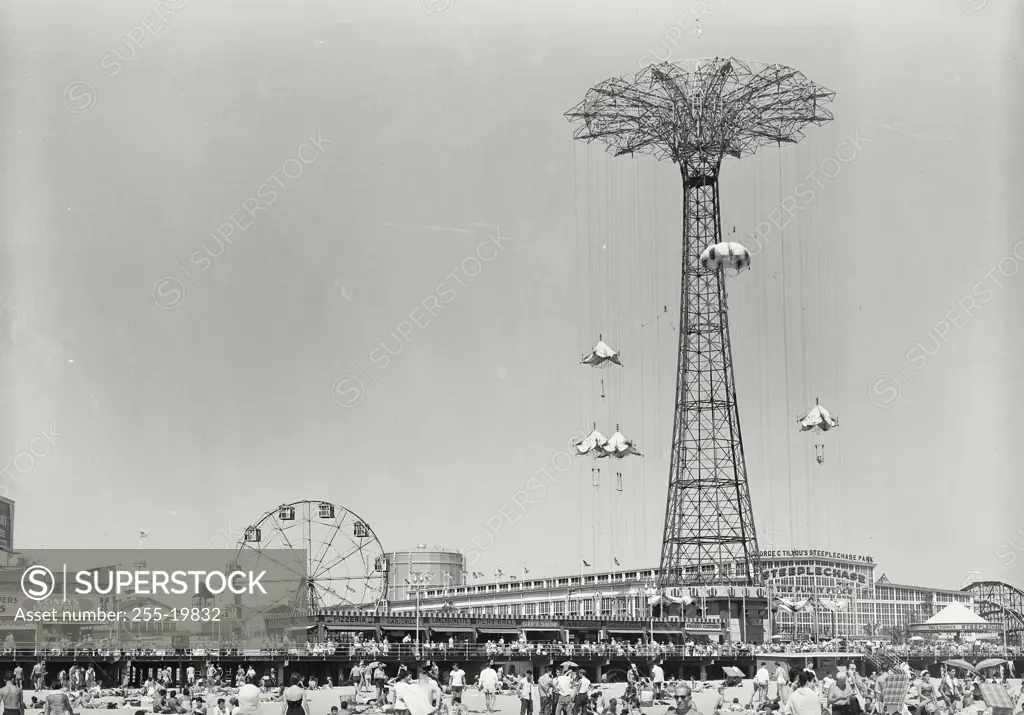 Vintage Photograph. Steeplechase Park showing the Parachute Jump and Ferris Wheel in the background, Coney Island, New York