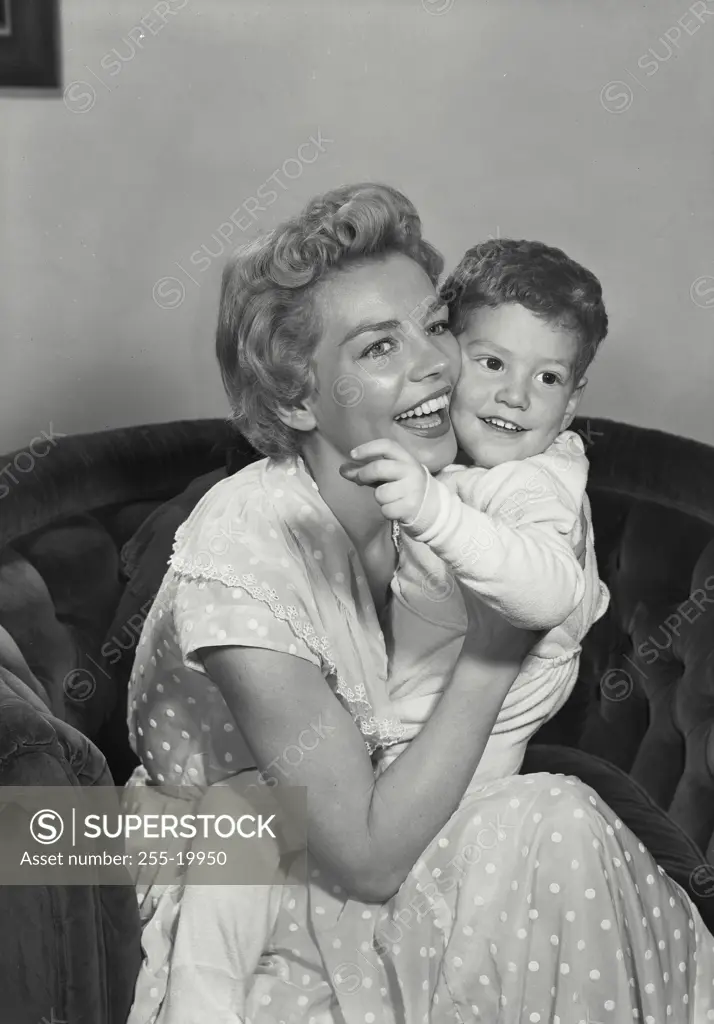 Vintage Photograph. Mother holding young son