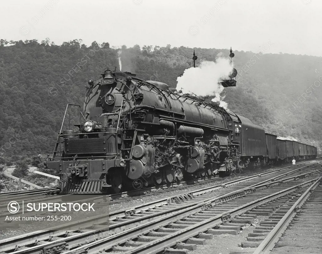 Vintage photograph. Coal being hauled by the B&O giant Mallet steam-type locomotive