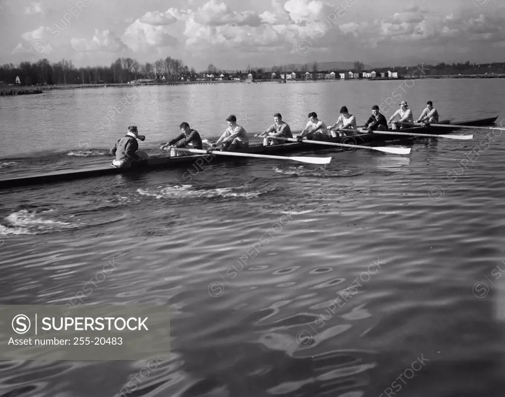 Group of men rowing a rowboat in a sweep rowing race, Lake Washington, Washington, USA