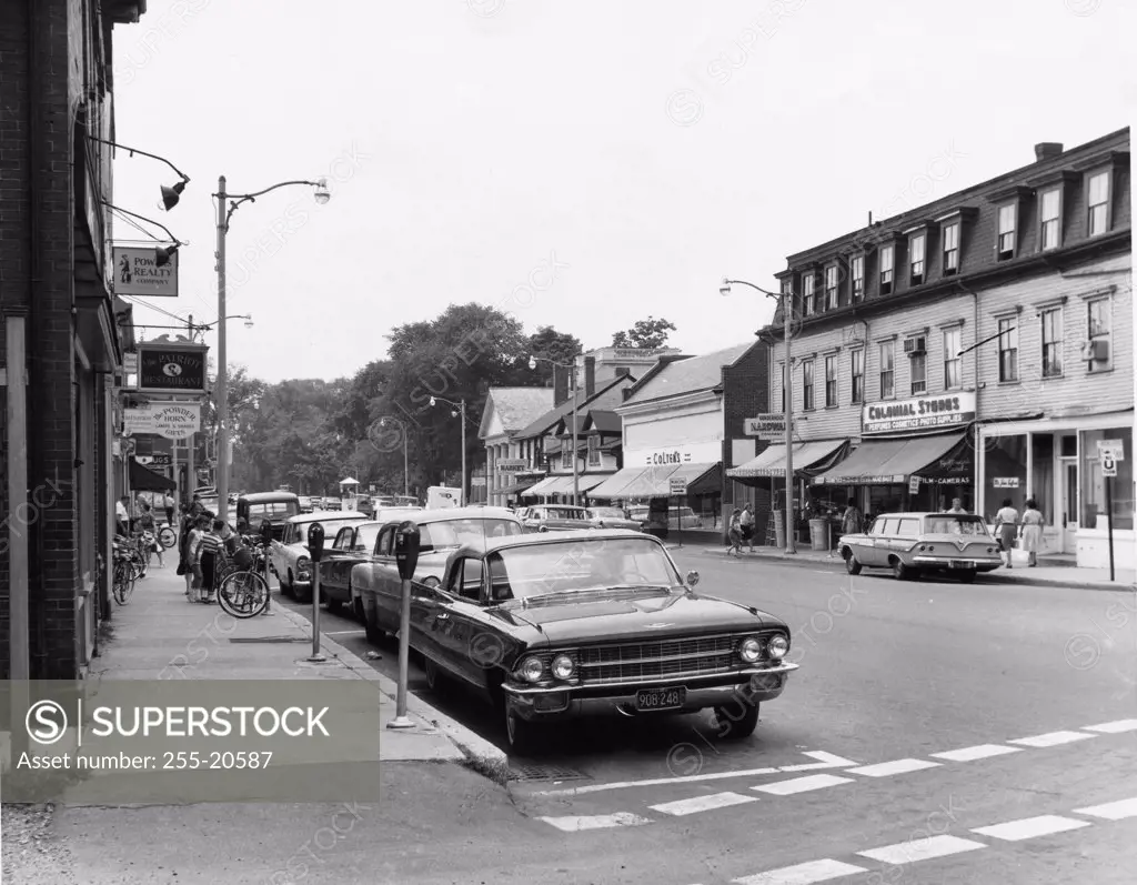Cars parked in a street in front of buildings, Concord, Massachusetts, USA