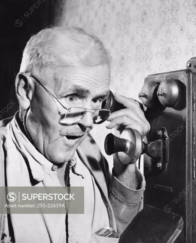 Close-up of a senior man talking on the telephone