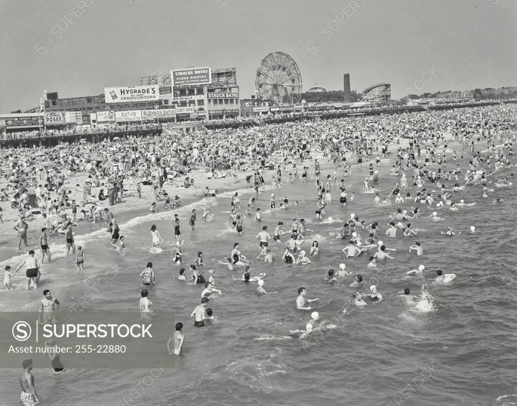 Vintage photograph. High angle view of tourists on the beach, Coney Island, Brooklyn, New York City, USA