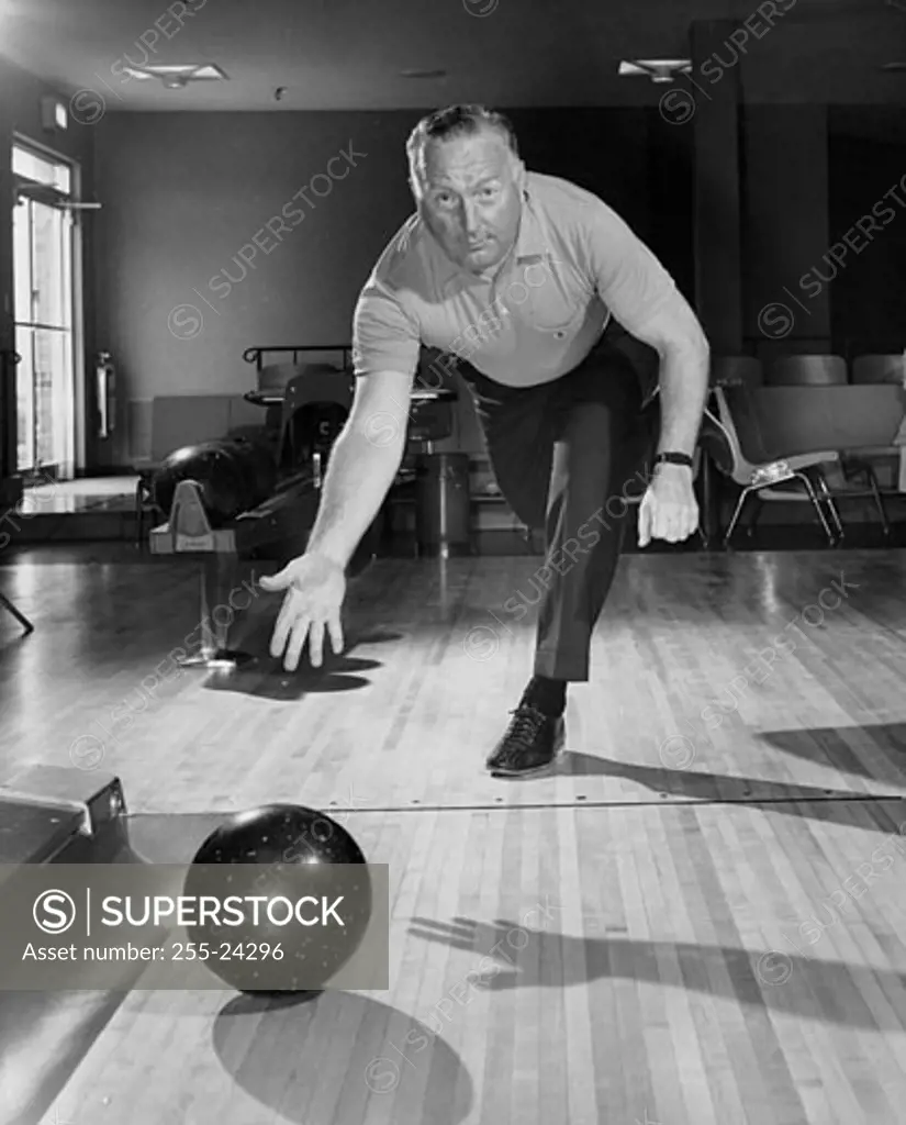 Mature man bowling