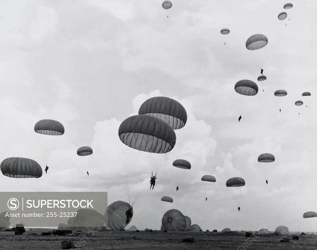 Low angle view of paratroopers parachuting, 82nd Airborne Division, Fort Bragg, North Carolina, USA