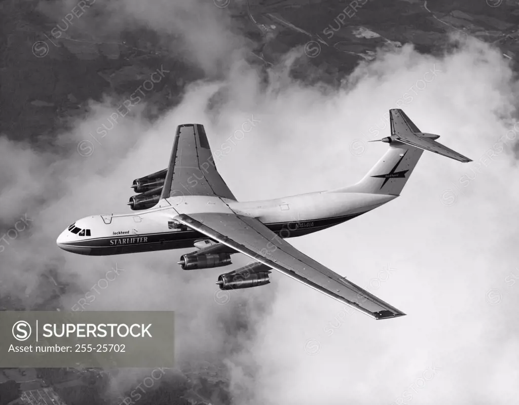 Lockheed Starlifter airplane flying in the sky