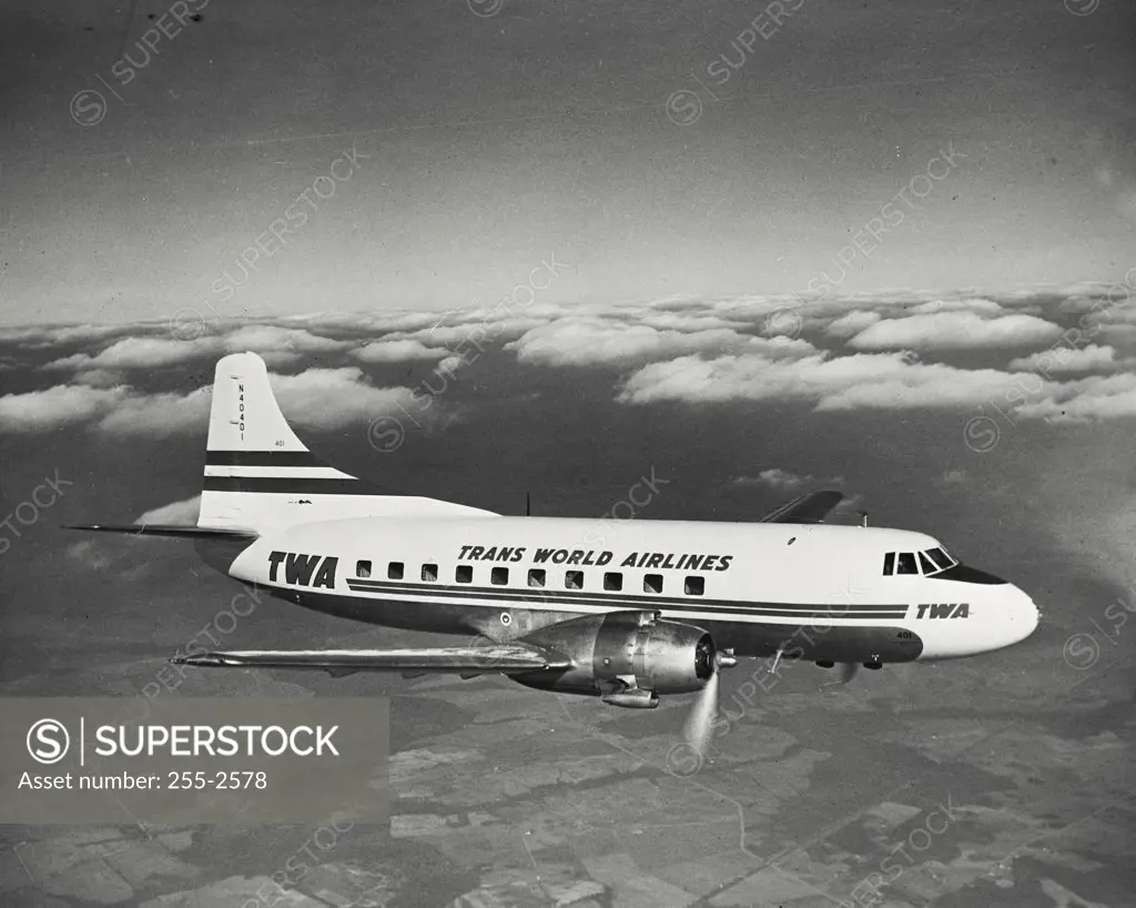 Vintage photograph. TWA plane in flight, Martin 404