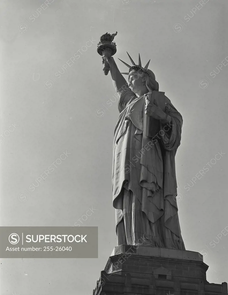 Vintage photograph. Low angle view of the Statue of Liberty, New York City, New York, USA