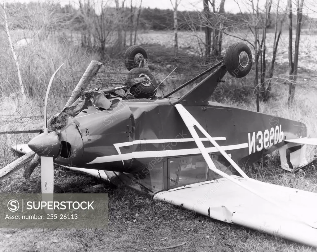 Crashed airplane in a field