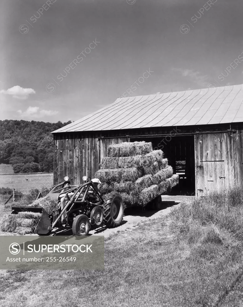 Tractor in front of a barn, Quechee, Vermont, USA
