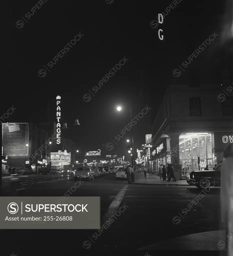 Vintage Photograph. Corner of Hollywood Blvd and Vine street at night, Los Angeles, California