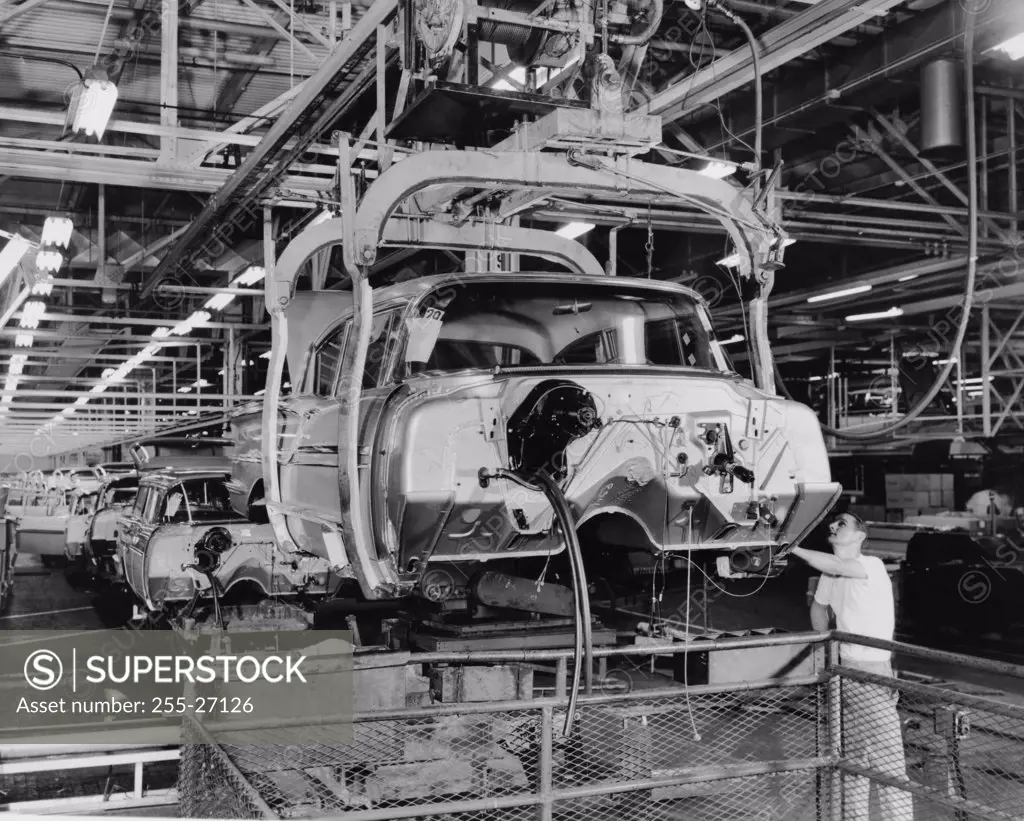 Worker working in a automobile factory, Detroit, Michigan, USA