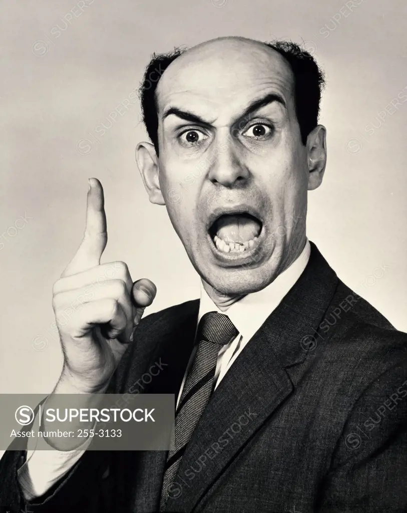 Portrait of a businessman shouting in anger