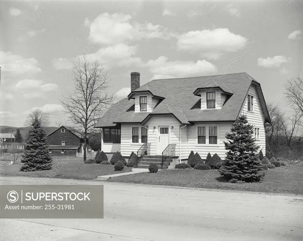 Vintage photograph. House on Route 23 near Butler New Jersey, small house, barn, topiary