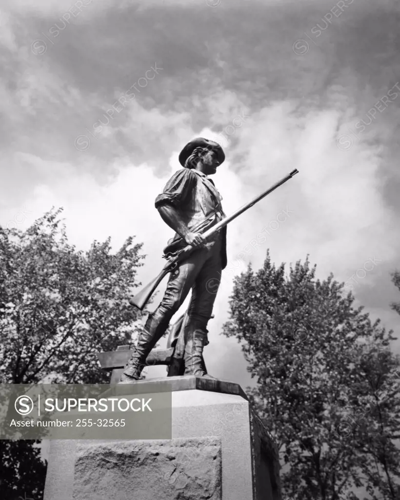 Low angle view of a statue, Minuteman Statue by Daniel Chester French, Concord, Massachusetts, USA