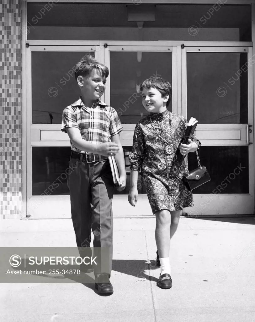 Boy and girl walking together