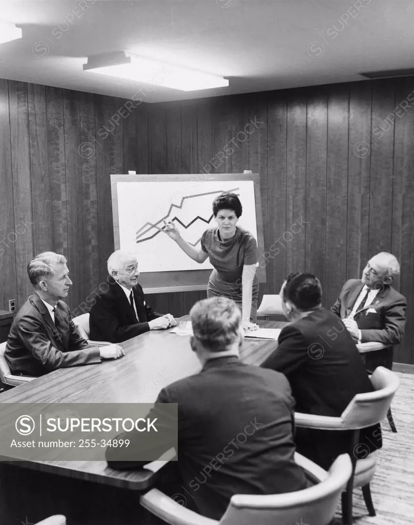 Businesswoman giving a presentation in a conference room
