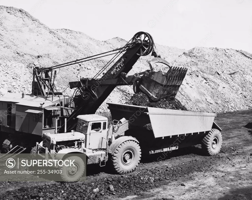 Loading coal in a dump truck in a mining operation