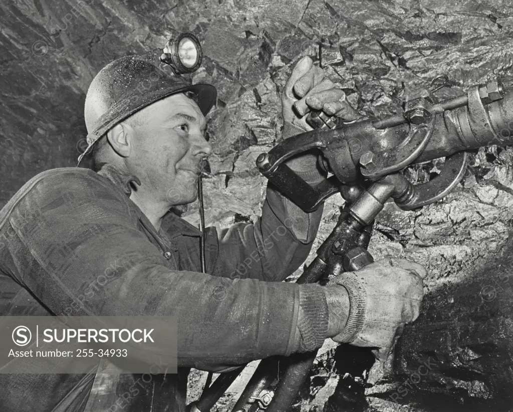 Vintage photograph. Rock drilling in the rich beaver lodge uranium field located in northern Saskatchewan