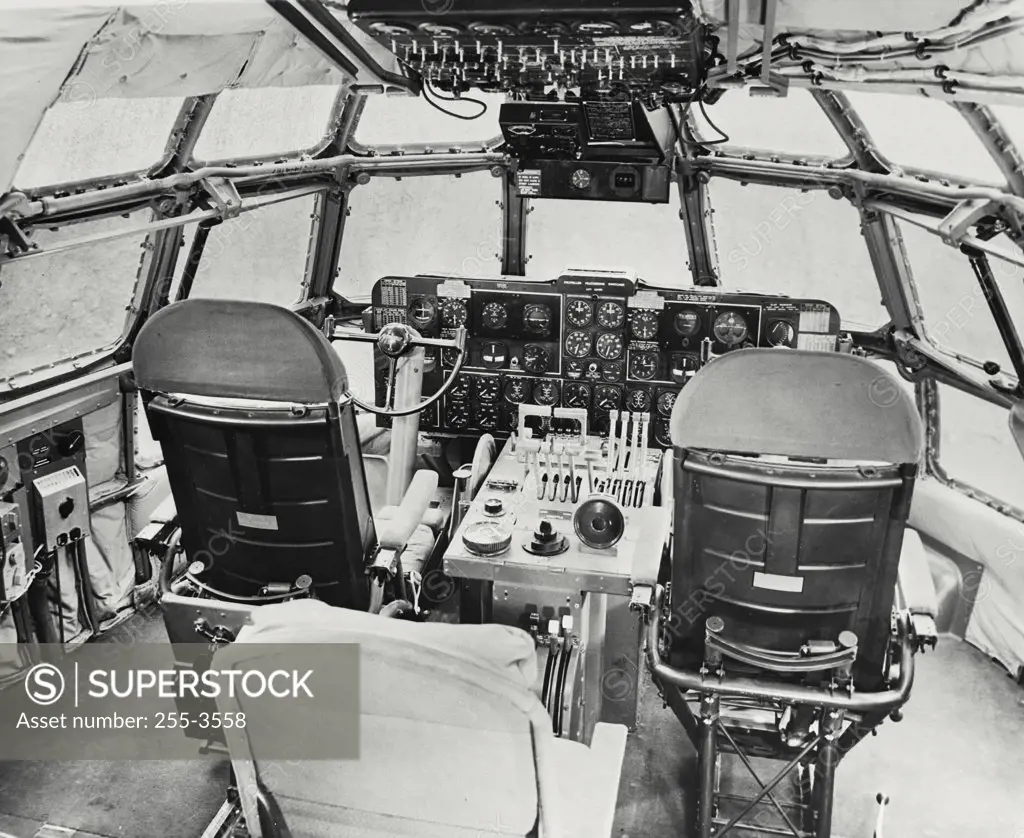 Vintage photograph. Interiors of a flight control cabin of an airplane, Boeing 377 Stratocruiser
