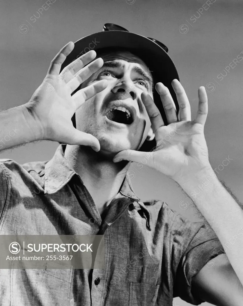 Close-up of a construction worker shouting