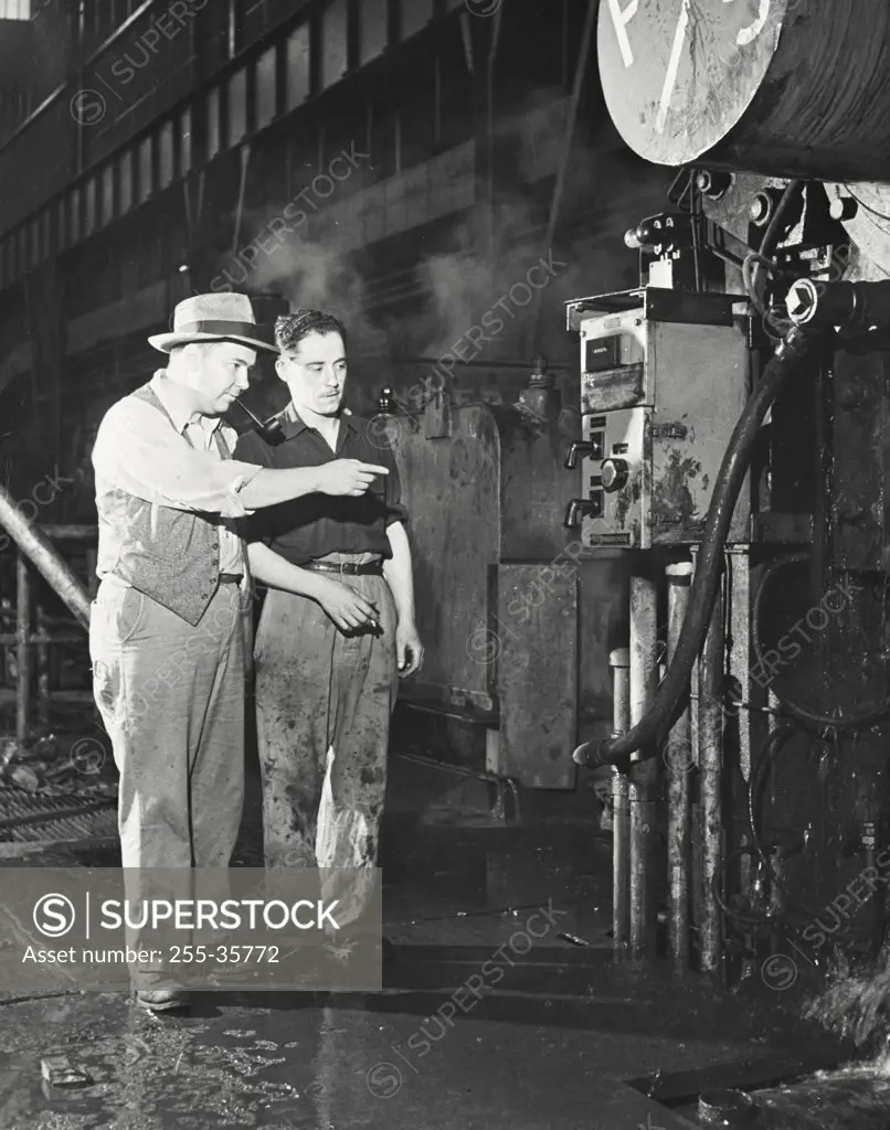 Vintage photograph. John Manning (left) and Edmond Wouters, Automatic Steel Rolling Mill, Denain, France